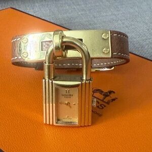 Hermes Brown Leather Kelly Padlock Bracelet Watch with Gold Hardware w/COA